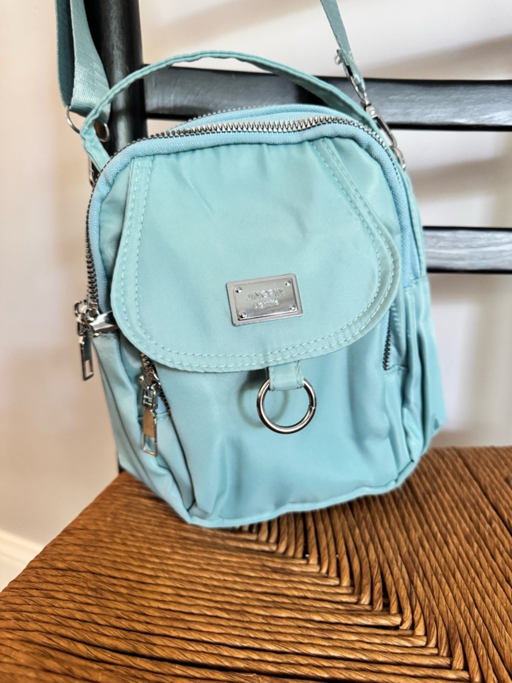 Light Aqua Crossbody Bag with Front Flap and Ring Accent